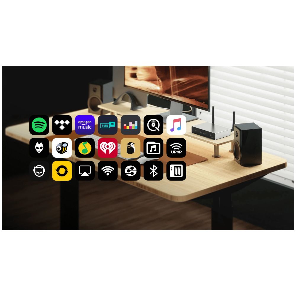 Modern office setup with a desk, computer monitor, and various icons on the screen.
