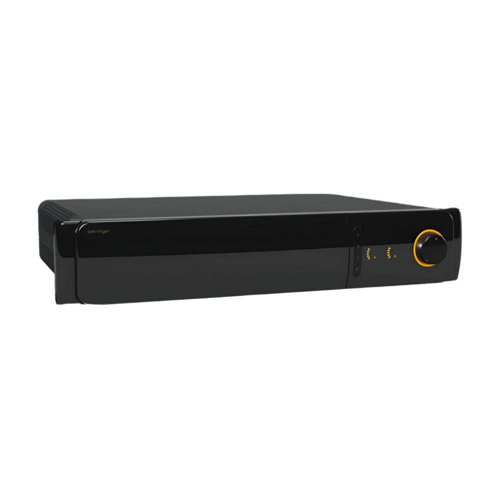 Black electronic device with a yellow button on a gray background