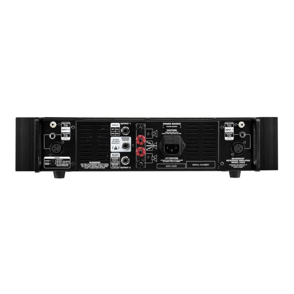 Back view of a black audio amplifier on a white background